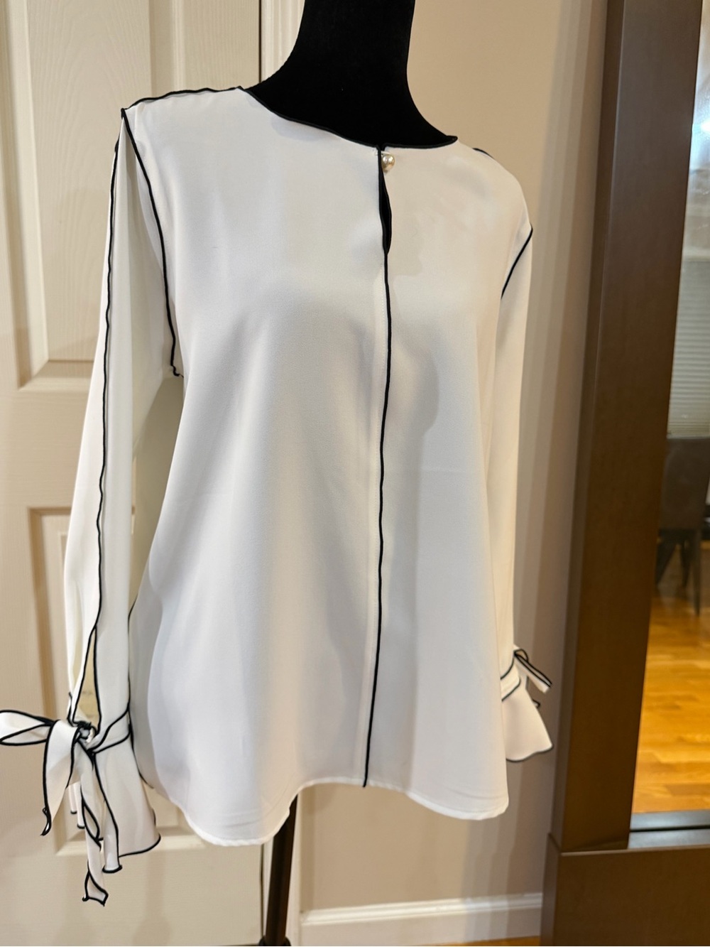 Modern Romance • Pearl-Kissed Ivory Blouse W/ Black Piping & Dramatic Bow Cuffs